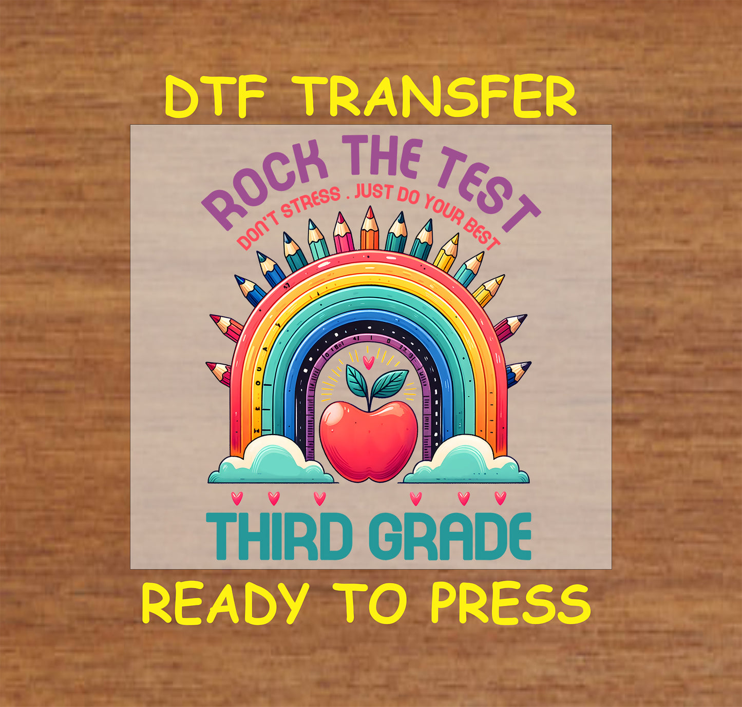Rock the Test Third Grade DTF transfer with a rainbow made of pencils, an apple, and motivational text.