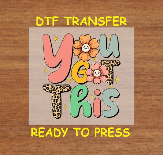 You Got This DTF transfer with retro text, leopard print, smiley flowers, and sparkles.