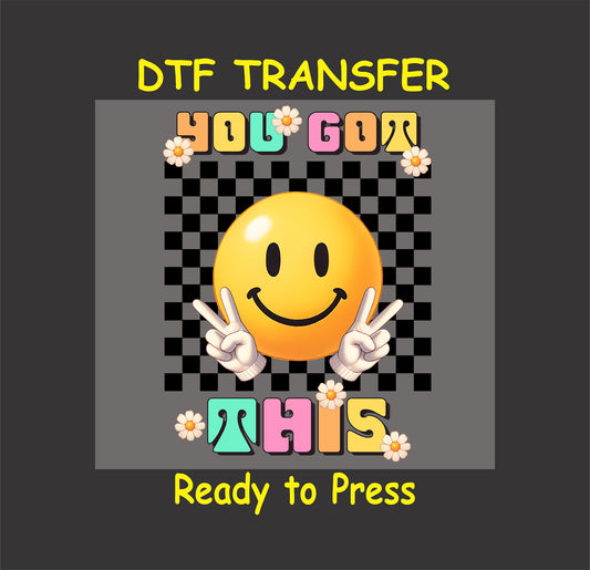 You Got This DTF transfer with a smiley face, checkered background, and retro text with flowers.