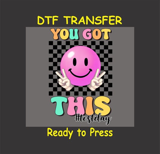 You Got This DTF transfer with a pink smiley, peace signs, and checkered background.
