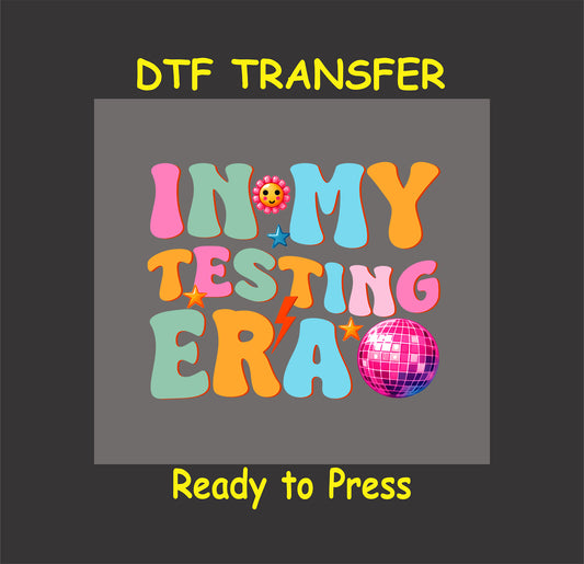 In My Testing Era DTF transfer with retro lettering, a disco ball, and stars.