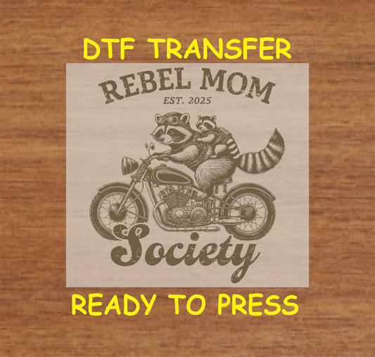 Rebel Mom Society DTF transfer with raccoons on a motorcycle in a vintage biker-style design.