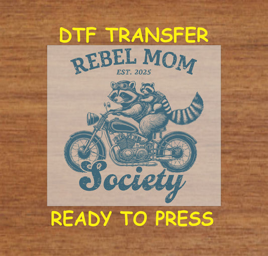 Rebel Mom Society DTF transfer with raccoons on a motorcycle in a vintage biker-style design.