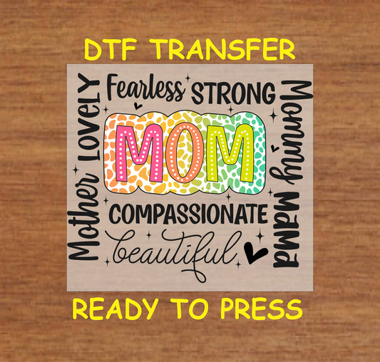 MOM DTF transfer with colorful letters and surrounding words like fearless, strong, and beautiful.
