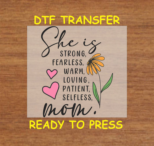 She Is Mom DTF transfer with inspirational words, hearts, and a floral accent.