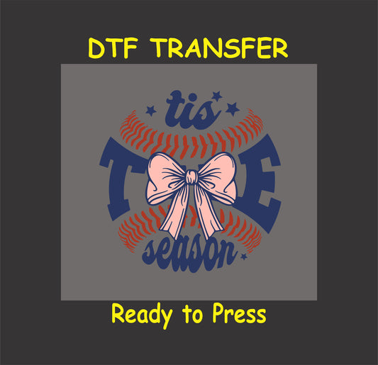 Baseball DTF transfer with the phrase ‘Tis the Season, featuring a bow and red stitching.
