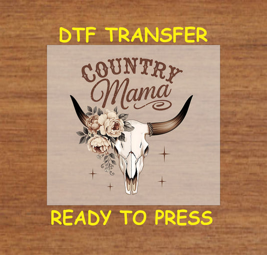 Country Mama DTF transfer with a cow skull, floral accents, and rustic typography.