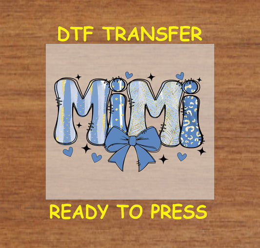 Mimi DTF transfer with a blue and gold glitter-inspired design and bow accent.