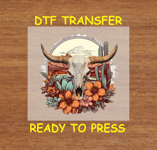 Longhorn skull with desert flowers, cacti, and a Western sunset in a DTF transfer design.