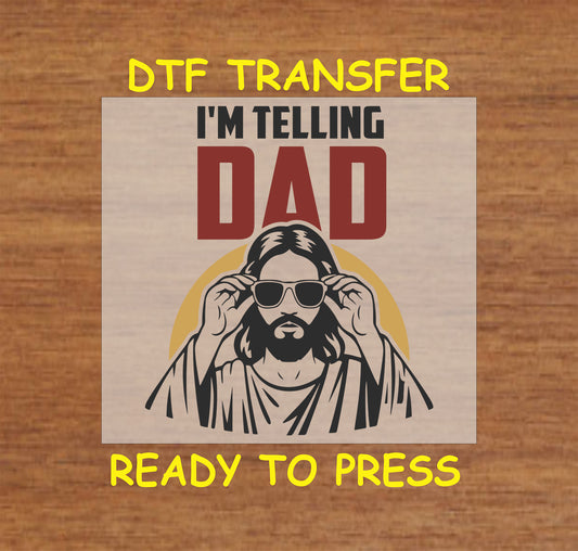 "I'm Telling Dad" DTF transfer featuring Jesus wearing sunglasses with a retro background.