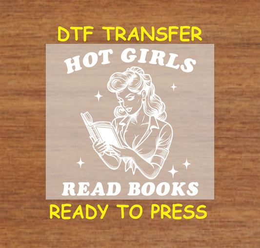 Retro pin-up style woman reading a book with stars around her. "Hot Girls Read Books" DTF transfer.
