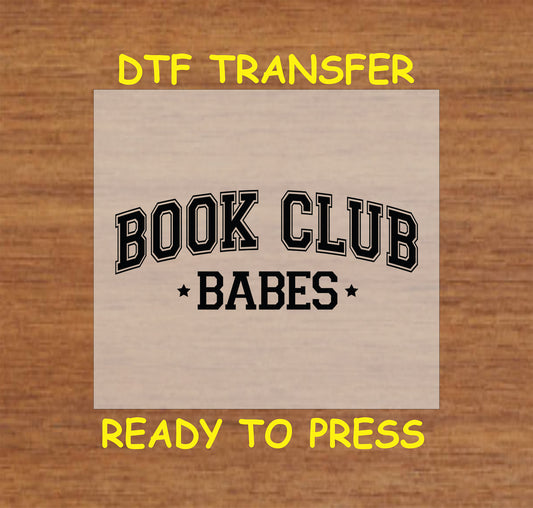Black varsity-style text reading "Book Club Babes" with stars.