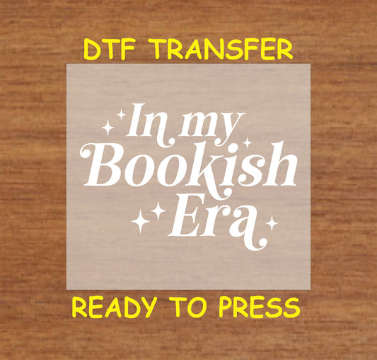 White text design reading "In My Bookish Era" with decorative sparkles.