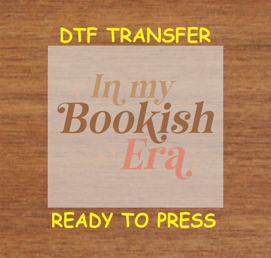 Multicolored text reading "In My Bookish Era" with decorative sparkles.
