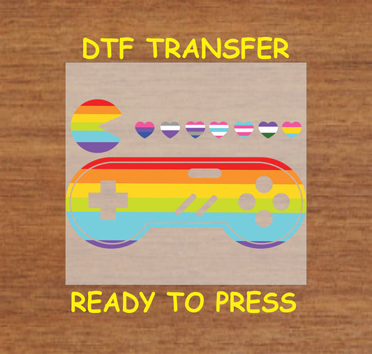 Pride Gamer DTF transfer with a rainbow gaming controller and pride flag hearts.