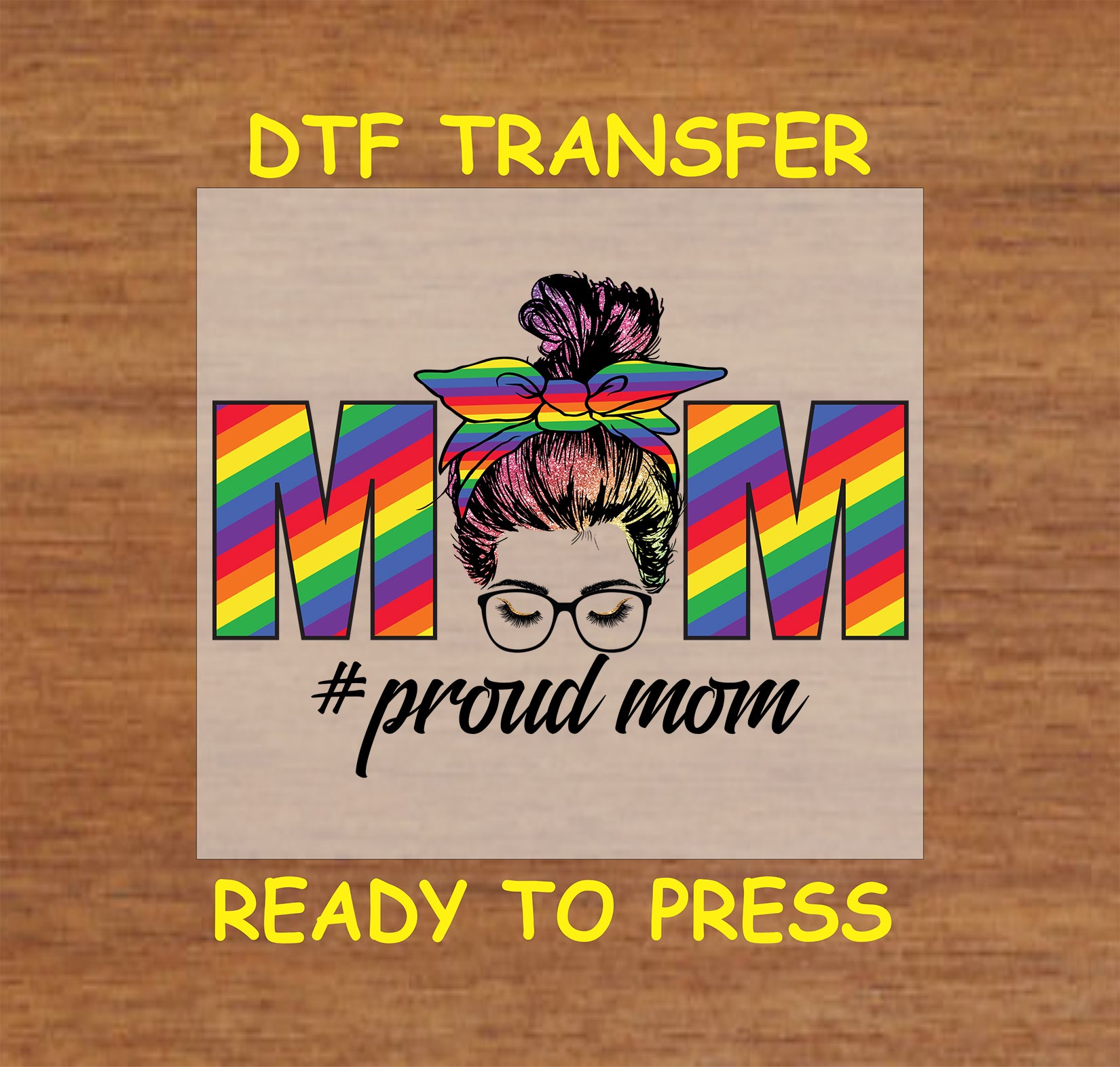 Proud Mom DTF transfer with rainbow text, messy bun, and glasses design.