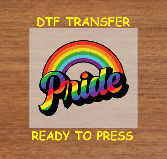Pride DTF transfer with bold rainbow script text and an arched rainbow design.