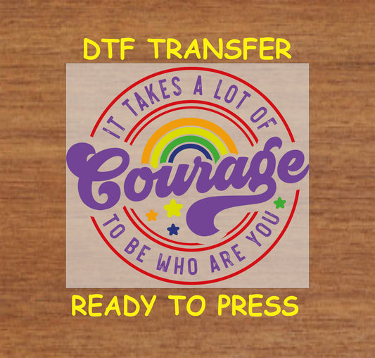 "It Takes A Lot of Courage" rainbow DTF transfer design with stars, ready to press onto apparel.