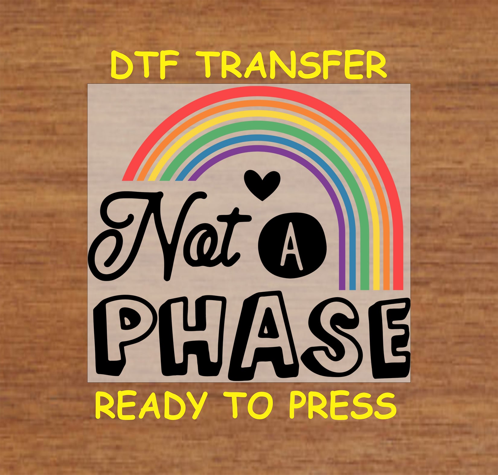 "Not A Phase" DTF transfer design with rainbow and heart, ready to press onto apparel.
