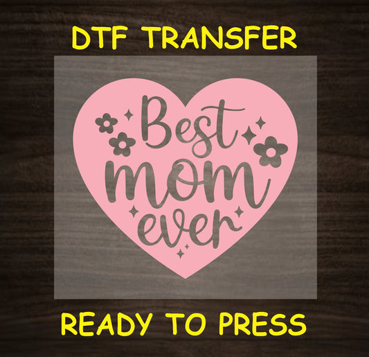 "Best Mom Ever" design with heart and floral details in a soft pink color.