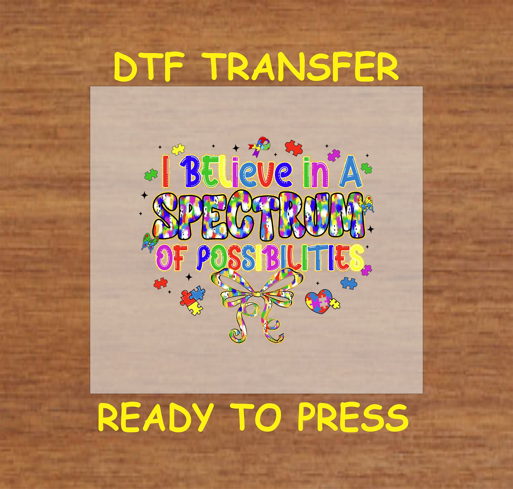 Colorful “I Believe in a Spectrum of Possibilities” text with puzzle pieces and bow.
