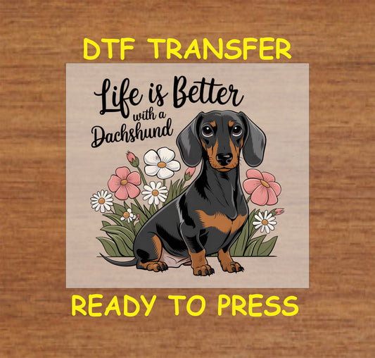 DTF transfer with dachshund surrounded by flowers and the phrase life is better with a dachshund.