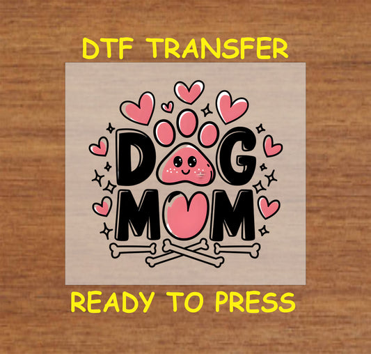 DTF transfer with pink paw, hearts, and the phrase dog mom in bold black letters.