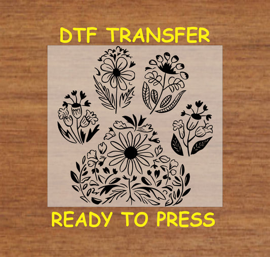 Black floral paw print DTF transfer with daisies and leaves in outline.