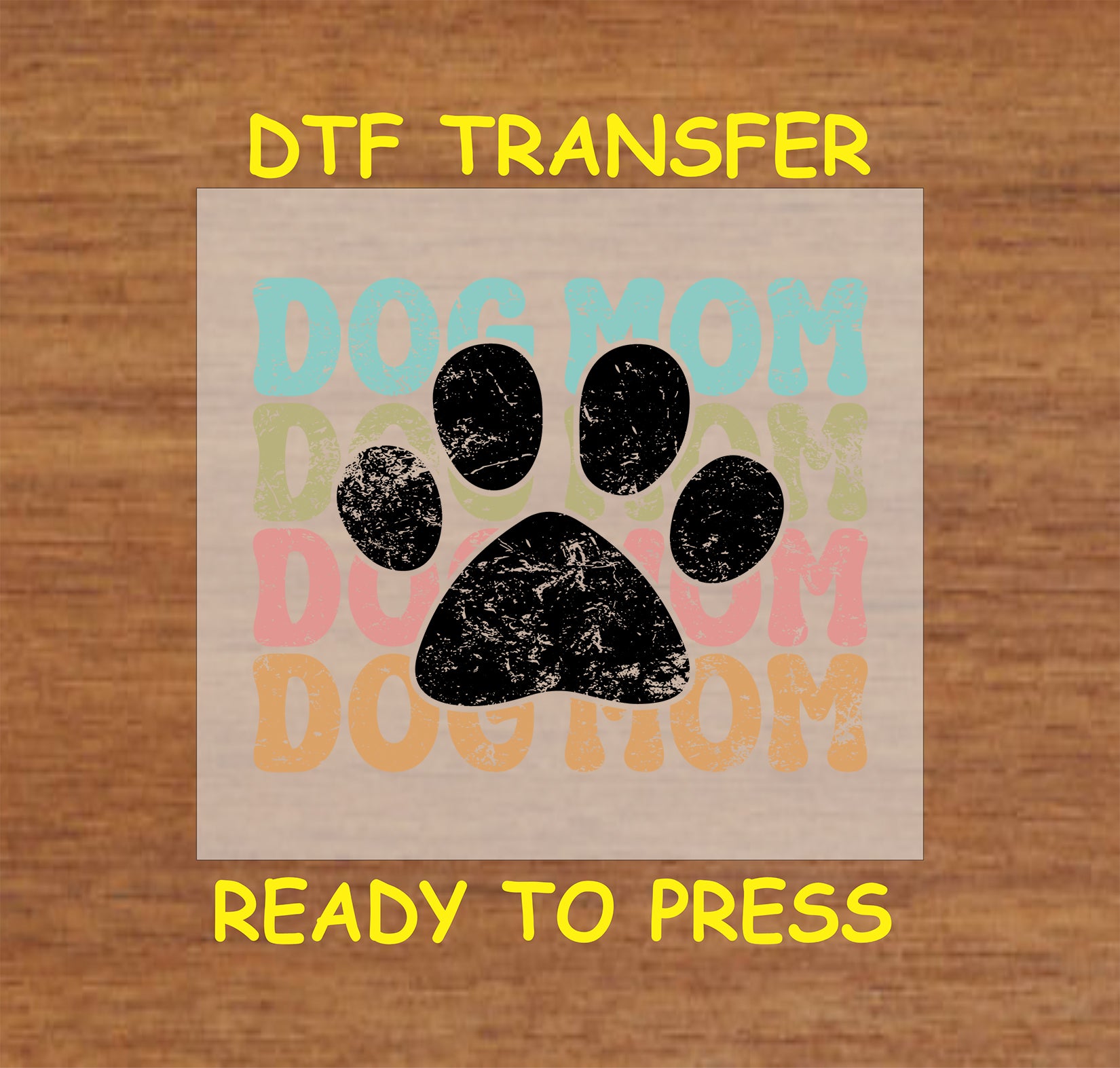Retro DTF transfer with large distressed black paw print and multicolor background text.