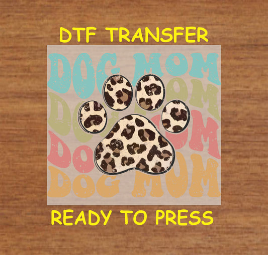 Retro rainbow DTF transfer with large leopard paw and colorful layered pet text.