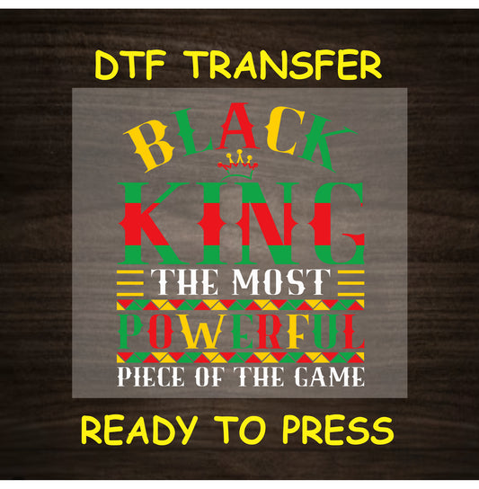 Black King DTF transfer with red, yellow, and green text and crown graphic.