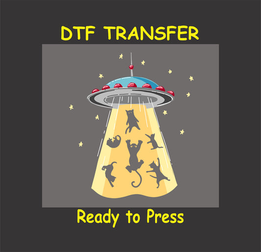 UFO beaming up multiple cats with stars in the background.
