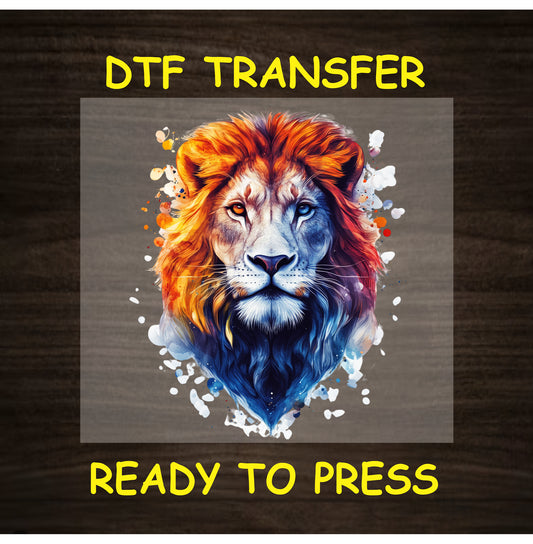DTF transfer of centered lion head with orange and blue mane and splatter background
