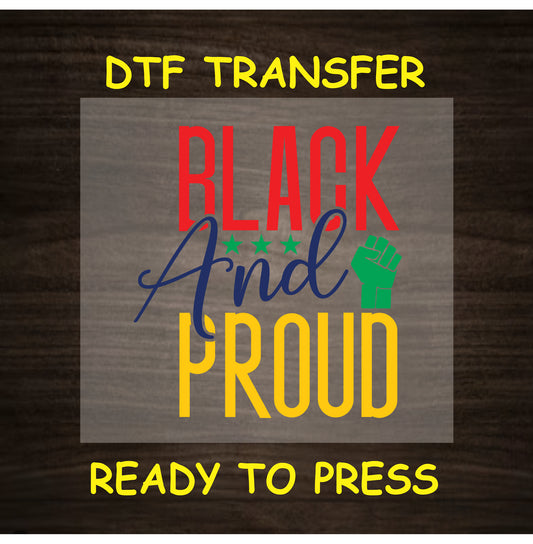 DTF transfer with “Black and Proud” in red, yellow, green with stars and raised fist