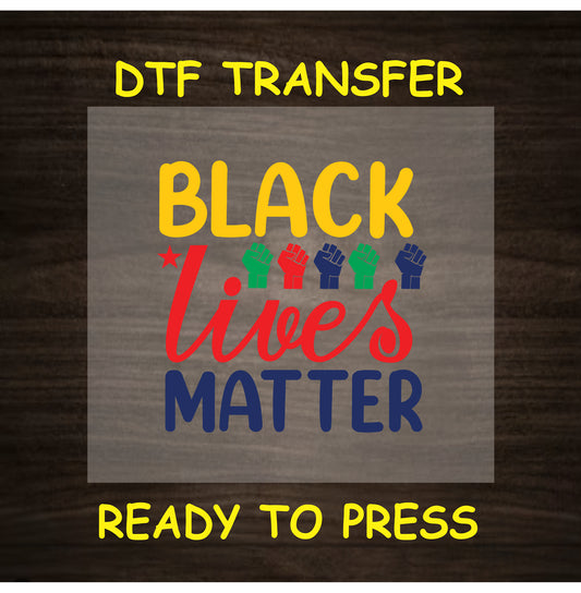 DTF transfer with “Black Lives Matter” text, colorful raised fists, and red star accent.