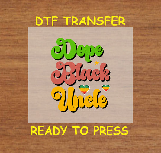 Dope Black Uncle text in red, green, yellow with African flag hearts and star on wood background.