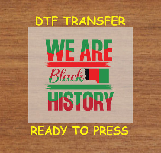 DTF transfer saying "We Are Black History" in Pan-African colors with a silhouette accent.