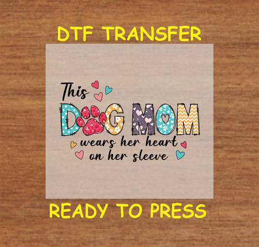 Dog Mom patchwork text with paw print and hearts, reads “wears her heart on her sleeve” DTF transfer