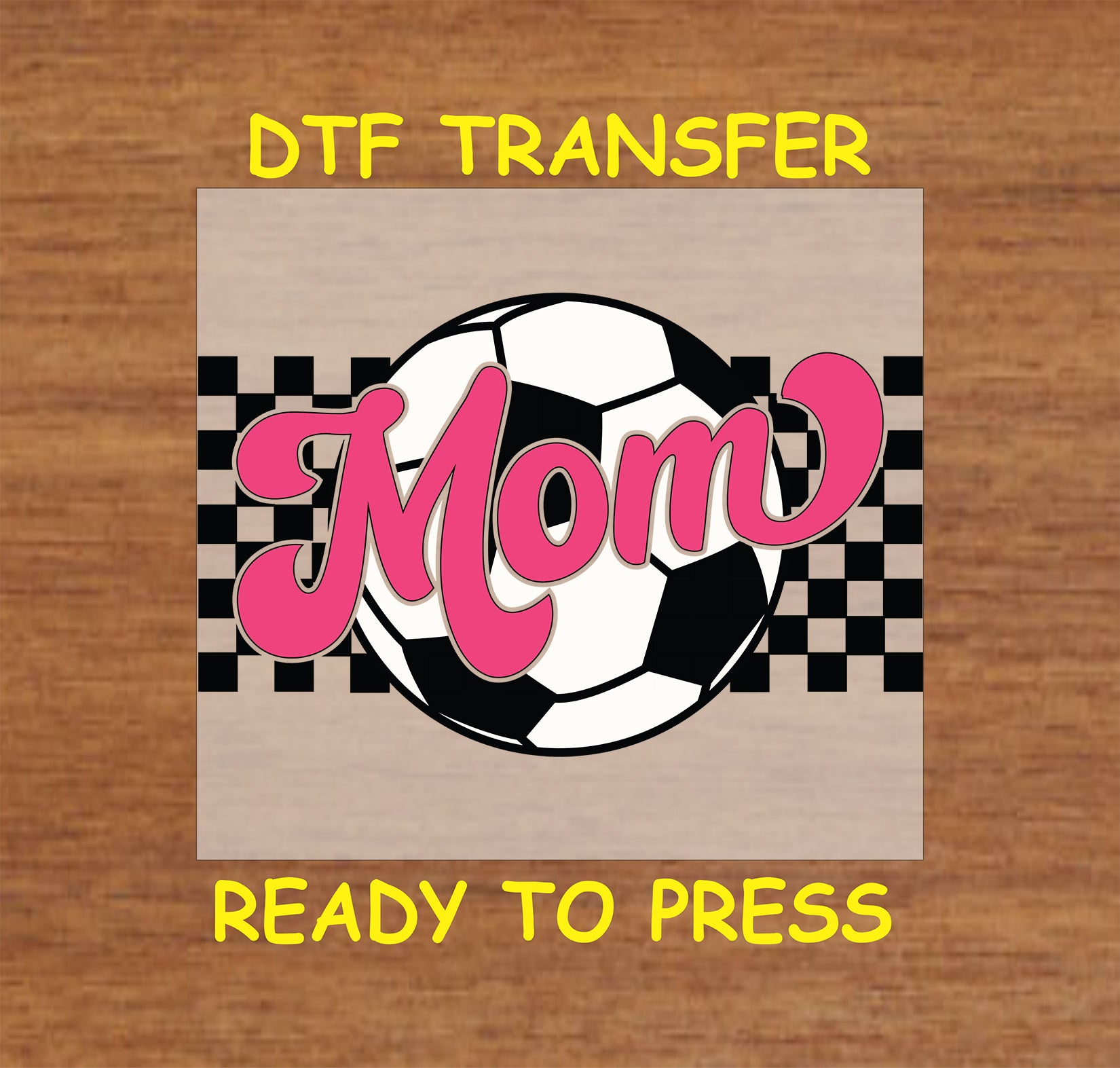 Pink mom text over soccer ball with checker background DTF transfer.