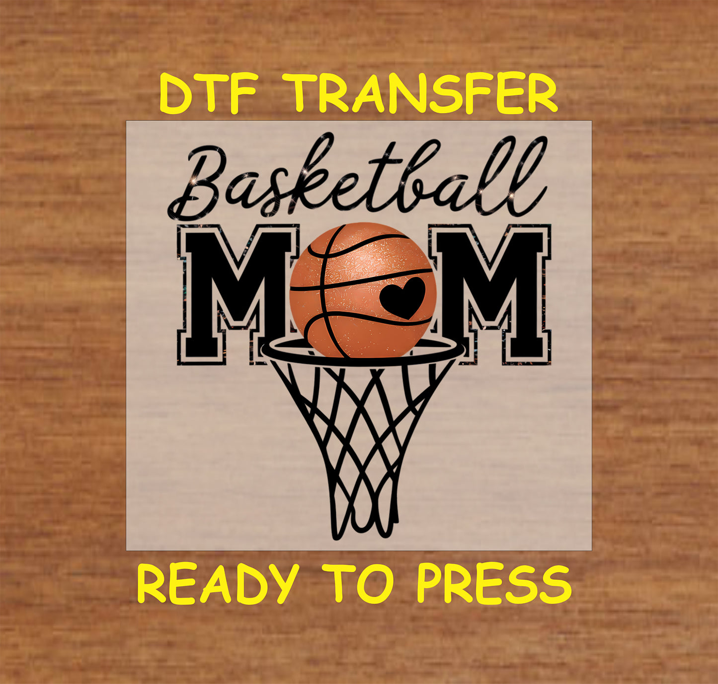 “Basketball Mom” DTF transfer with basketball and hoop graphic and heart detail.