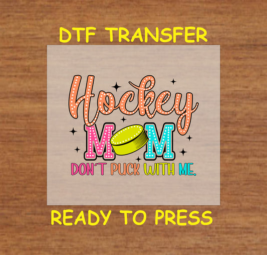 Hockey Mom DTF transfer with colorful letters, puck graphic, and “Don’t Puck With Me” phrase.