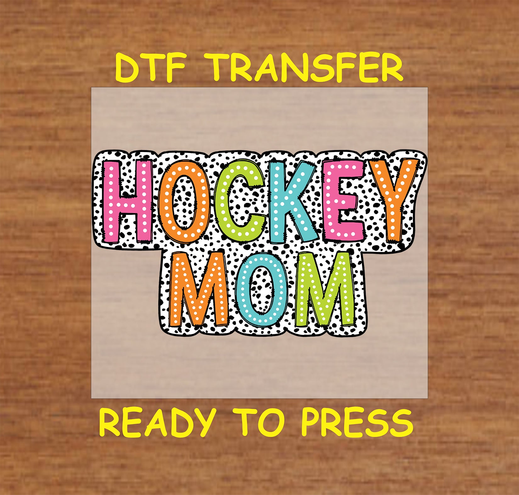 Colorful Hockey Mom DTF transfer with polka dot background and bold block lettering.