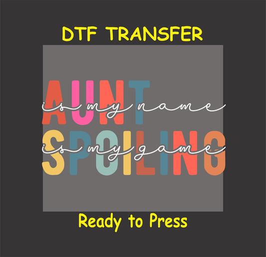 Aunt DTF transfer with colorful block letters and cursive “is my name, is my game” overlay.