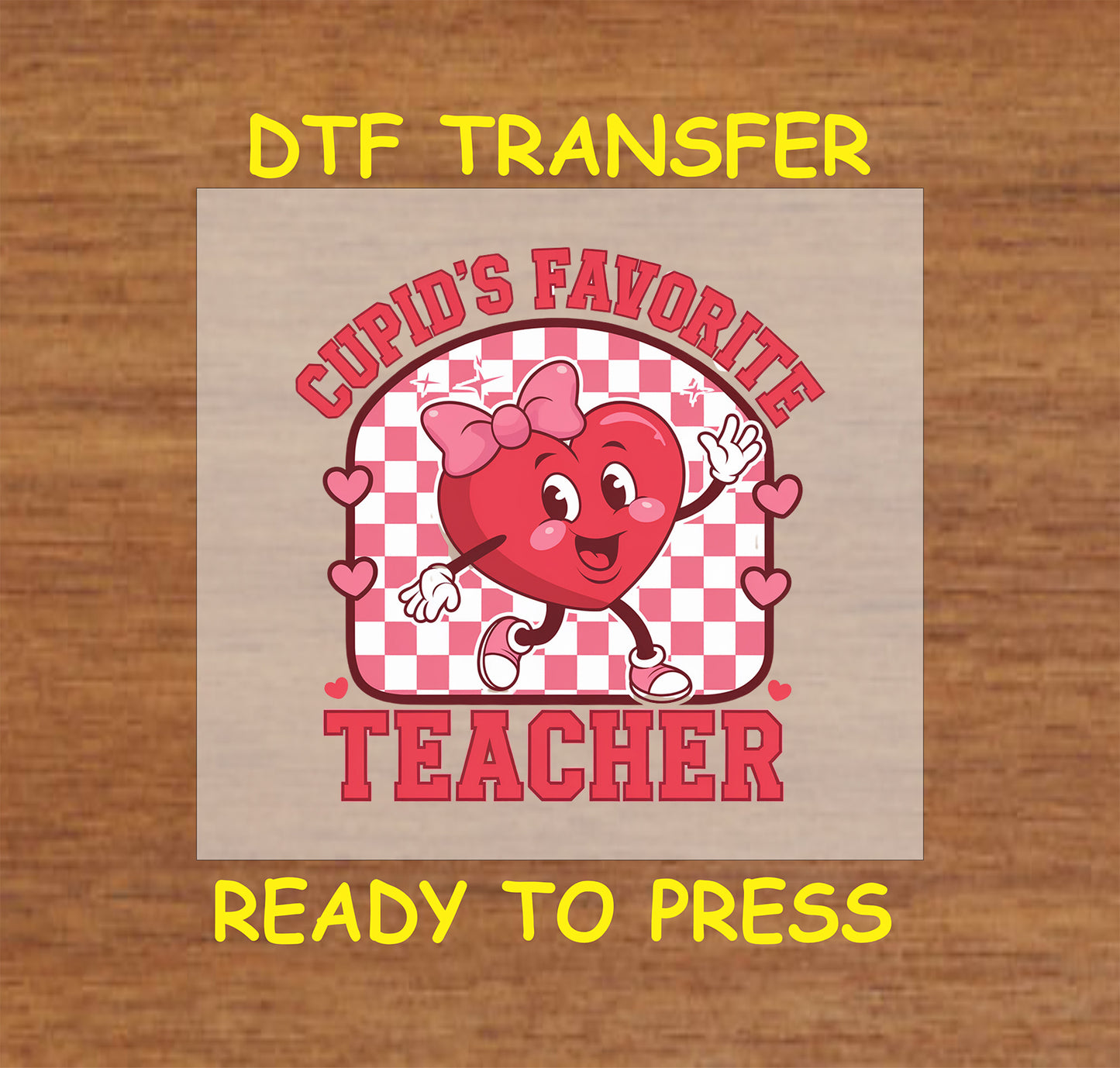 Cupid’s Favorite Teacher DTF transfer with heart character and checkered background.