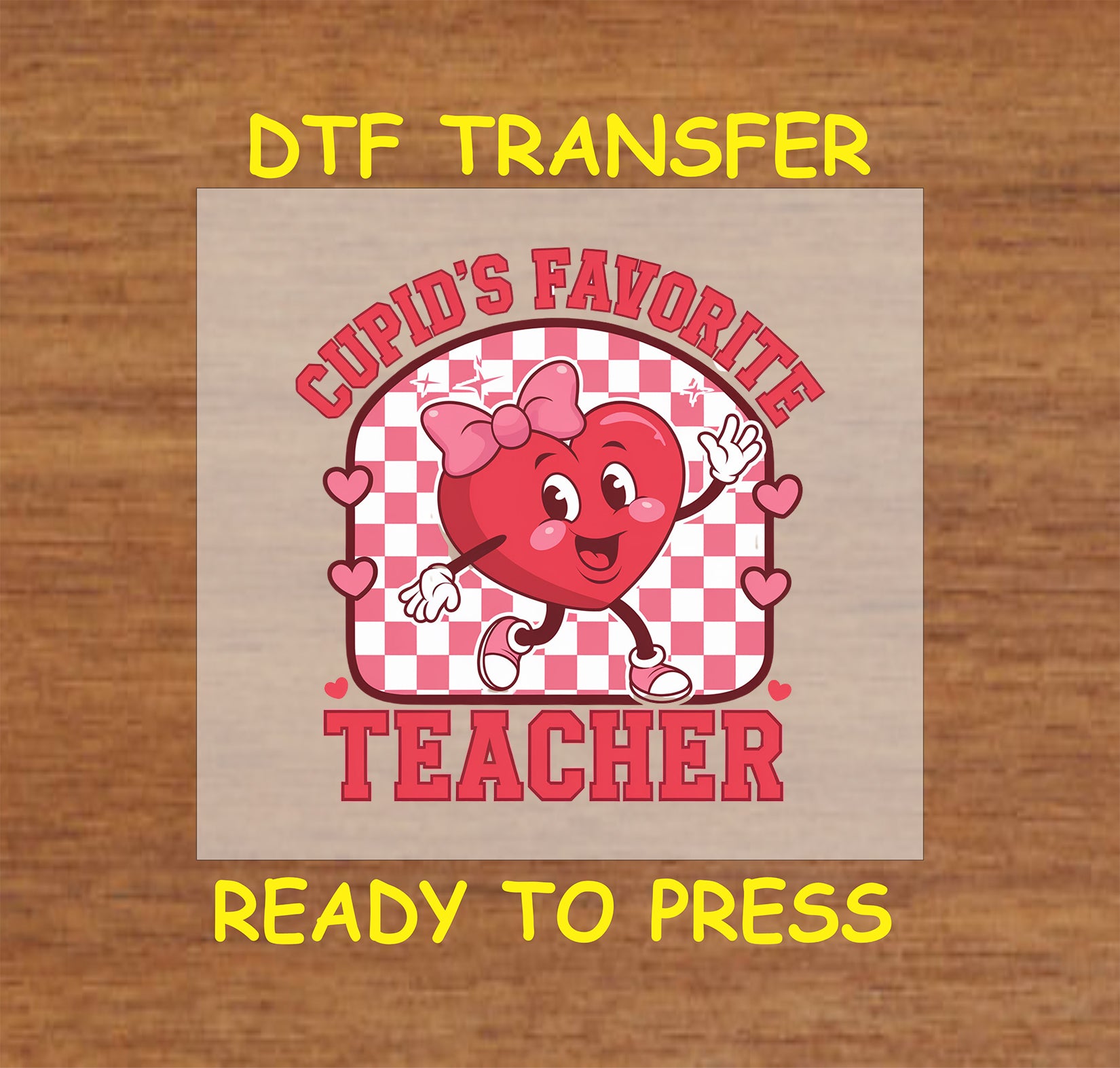 Cupid’s Favorite Teacher DTF transfer with heart character and checkered background.