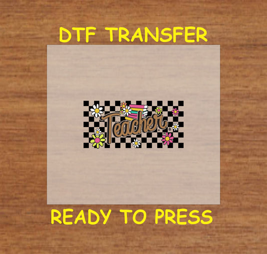 Checkerboard teacher DTF transfer with flowers and books.