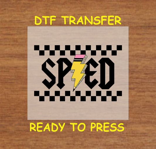 “Sped” DTF transfer with yellow pencil lightning bolt and checkered border.