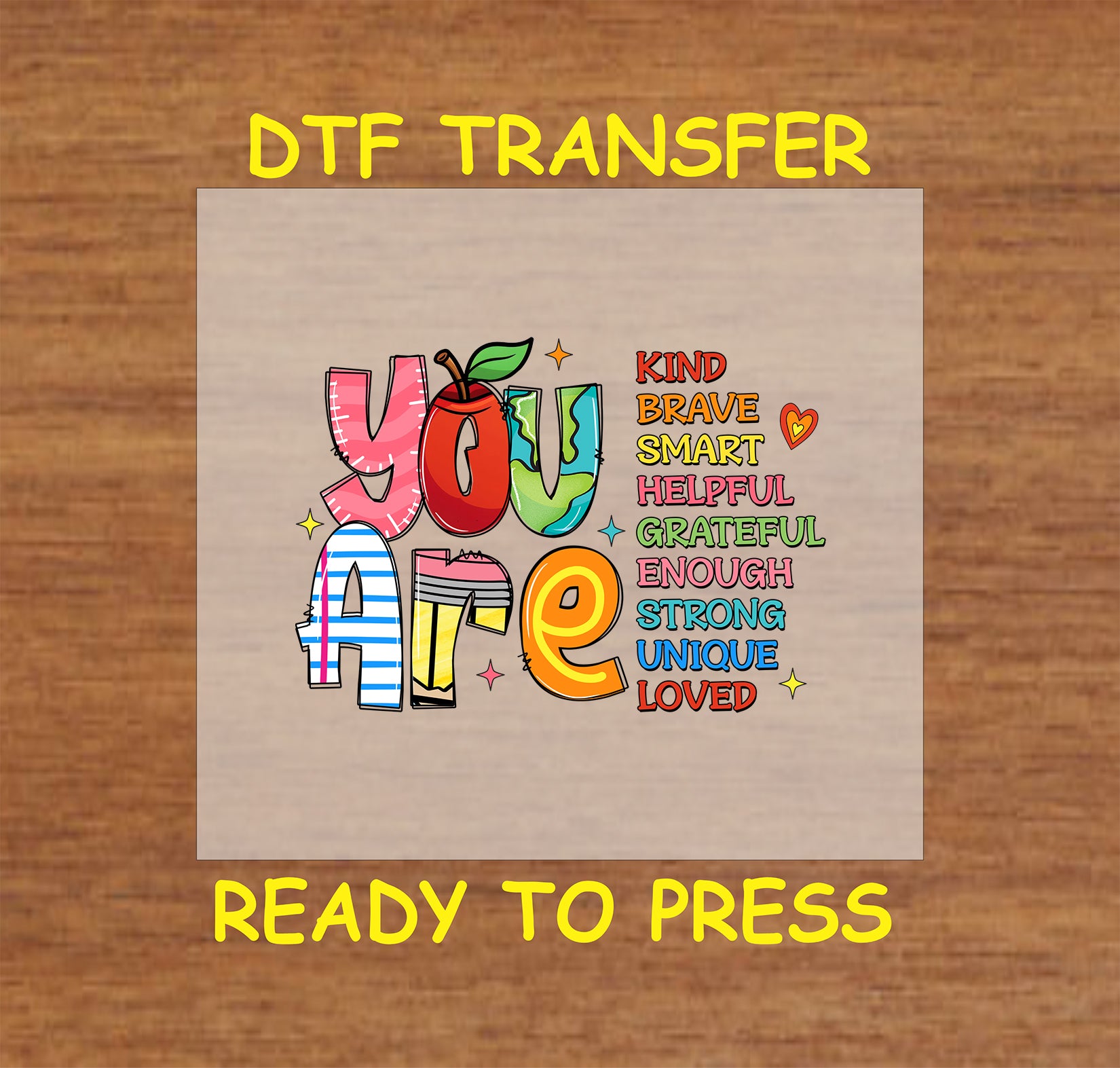 DTF transfer with colorful "You Are" text and affirmations like kind, brave, smart, loved.