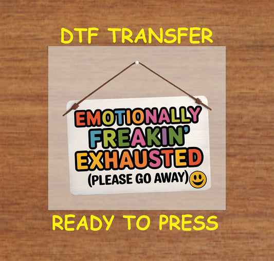 DTF transfer with colorful text saying Emotionally Freakin’ Exhausted and a go away message.