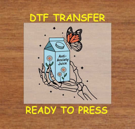 DTF transfer of skeleton hand holding anti-anxiety juice carton with butterfly and daisies.